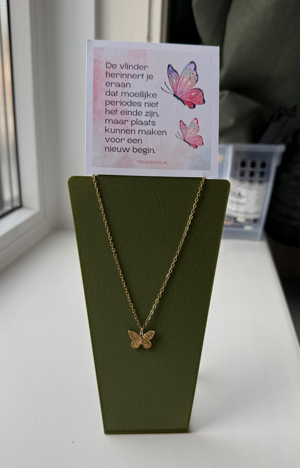 Troost vlinder ketting - goud