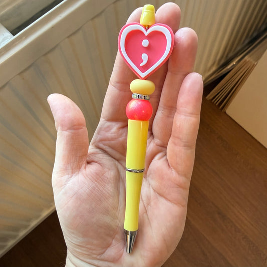 Gele/roze pen- Semicolon