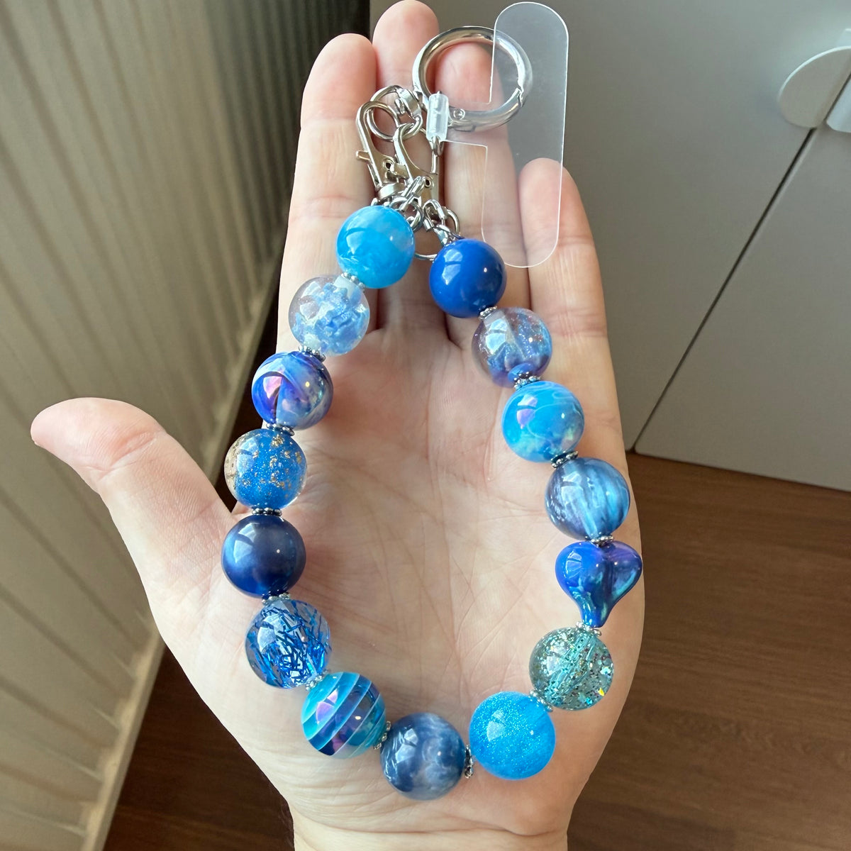 Telefoon/tassenhanger blauw