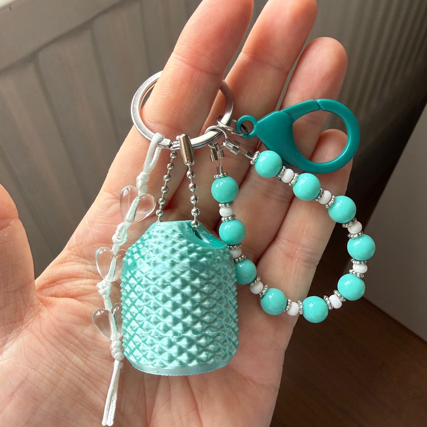 Spikey fidget medicatie houder - aqua small